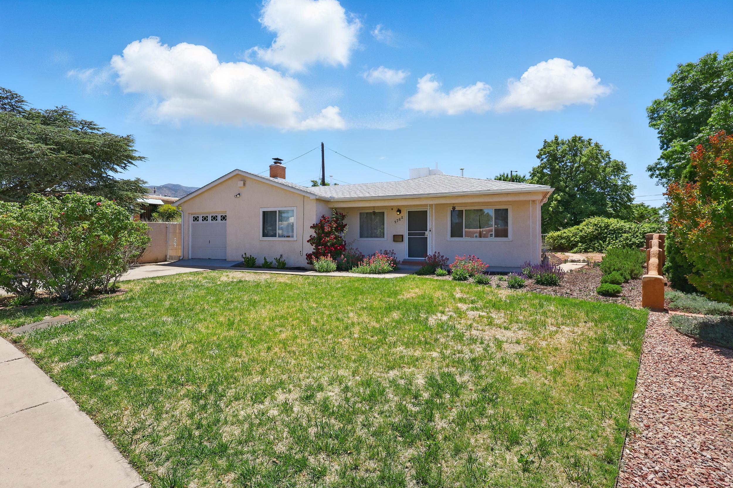 9722 APACHE Avenue NE - Main Image